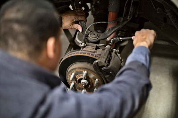 a man working on brakes