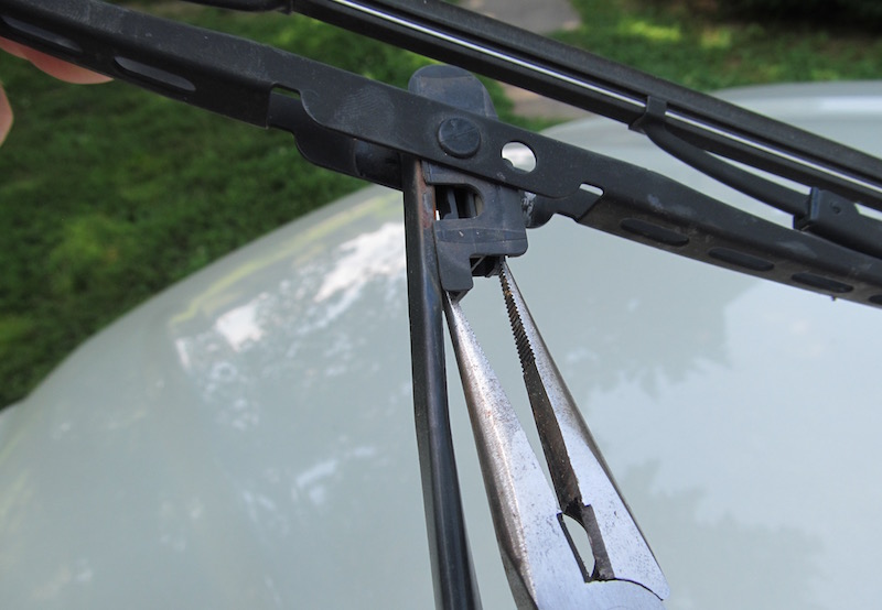 windshield wiper blade being replaced