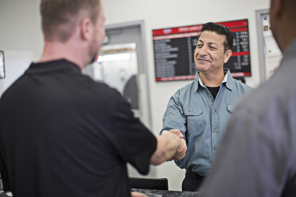 shaking hands with service advisor