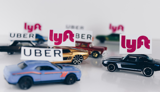 Uber and Lyft logos