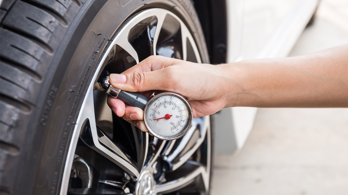 Using Tire Pressure Gauge