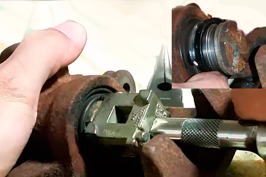 rear caliper piston removal